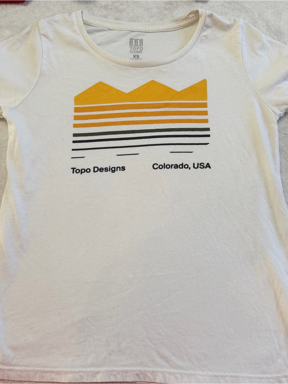 Topo Designs White Tee with Yellow Mountain Stripe Graphic